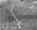 Fig. 33. B-24 hit by flak